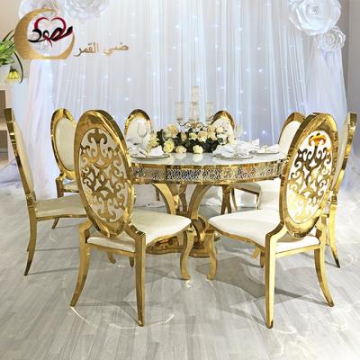 China Modern gold stainless steel luxury wedding table and chairs for dining room for sale