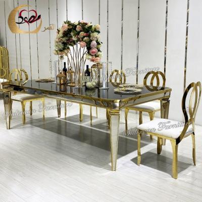 China Dining table set mirror glass tabletop gold wedding stainless tables for sale