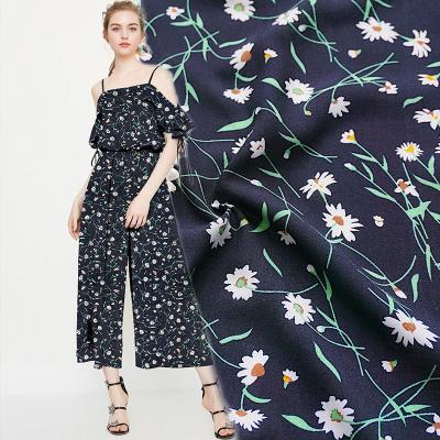 China Hot Sale Fashion Plain Style Blackout New Style Floral Woven Design 100% Rayon Printed Fabric Dress for sale