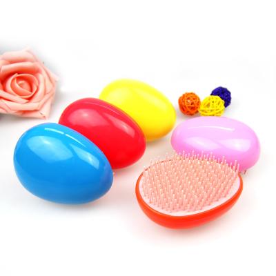 China Home Creative Plastic Egg Shaped Knot Plastic Knot Hair Tools Beauty Travel Straight Hair Comb for sale