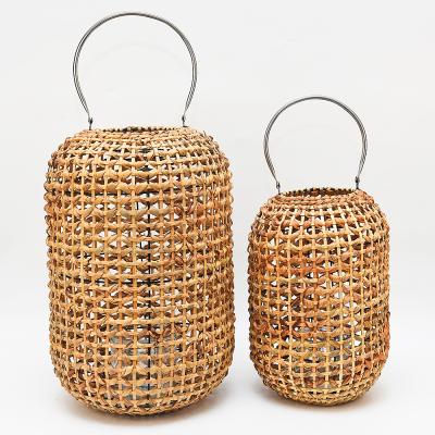 China Luxury Round Rattan Candle Lantern With Stainless Steel Handle New Design Hanging Wooden Candle Lantern for sale