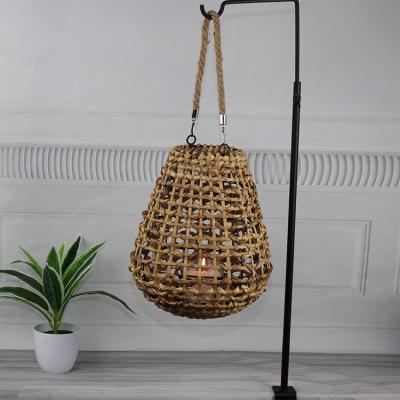 China Wholesale Home Decoration Country Style Rattan Lantern with Rope Handle and Inside with Glass Tube for Garden and Home Decor for sale