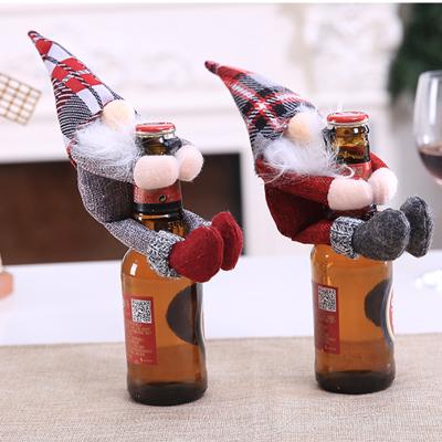 China Christmas 2021 Cloth Santa Doll Holding Red Wine Faceless Covers Christmas Bottle Decoration Dinner Table Decor Home New Year Gift for sale