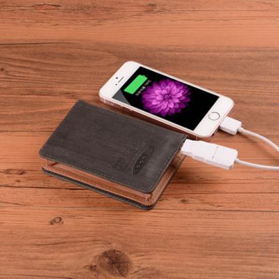 China GPS New Next Coming Cheap Price Business Card Holder Smart Wallet With Power Bank for sale