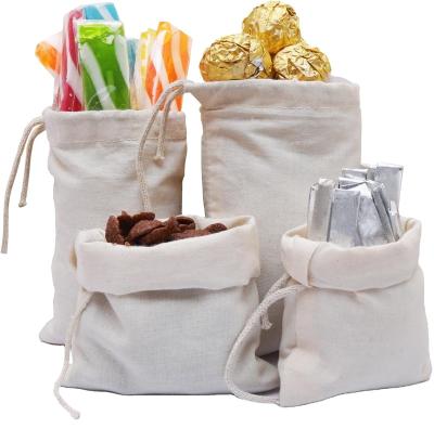 China Recyclable Natural Unbleached Cotton Fabric Food Packaging Bag candy Drawstring Pouch for sale