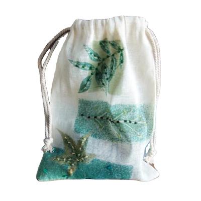 China Recyclable Thin Silk Printed Gold Muslin Cotton Packaging Pouch Transparent Muslin Drawstring Packaging Bag for sale