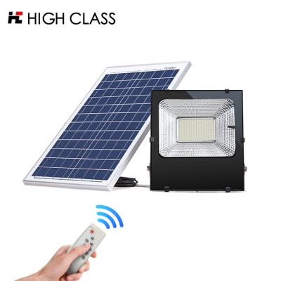 China Lightweight 100 watt high efficiency ip65 20w 30w 50w remote control+ anti-glare outdoor backyard led solar floodlight for sale