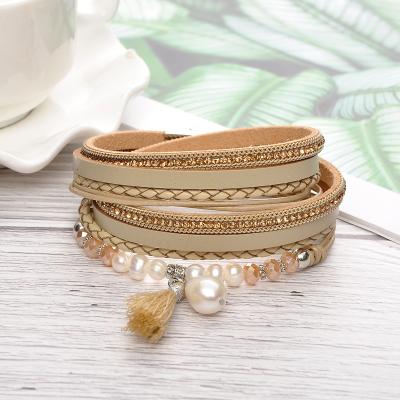 China Amazon European and American Explosive Freshwater Pearl Style Crystal Tassel Multilayer Cowhide Lady Magnetic Clasp Bracelet Manufacturer for sale