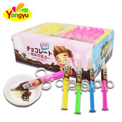 China Liquid Hot Chocolate Double Color Chocolate Candy Pack In Toy Syringe for sale