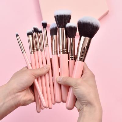 China Angular blush Bueart 12Pcs Rose Gold makeup set brush set on chic pink handle brochash de maquillaj for sale