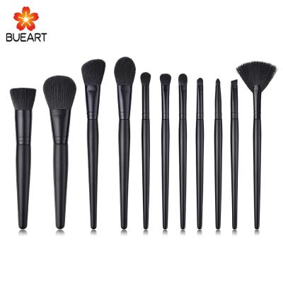 China Angular Blush High Quality Handle Cleansing Brush Hot Selling Black Wooden Makeup for sale