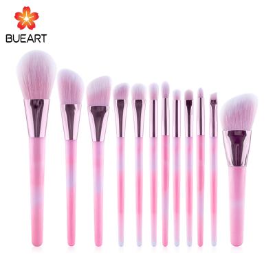 China Angular Blush 12pcs High Quality Purple Pink Makeup Brushes With Glitter Handle for sale