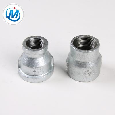 China Gas/Oil/Water Piping Parts Names Reducing Socket Malleable Iron Pipe Fitting Casting Iron for sale