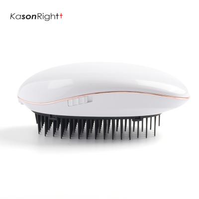 China 2022 Latest New Compact Design Mini Portable Comfortable Ionic AAA Battery Powered Hair Brush for sale