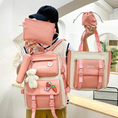 China New Harajuku portable canvas female Korean version large capacity 5 in 1 high school college school bag wholesale backpack for girls for sale