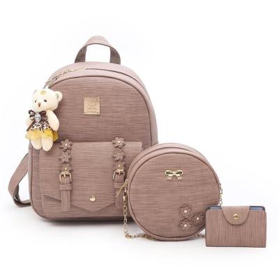 China New Portable Wholesale Korean Mother and Child 3 Piece Retro Fashion Women Bag Solid Color PU Leather Bag Girls Backpack Set for sale