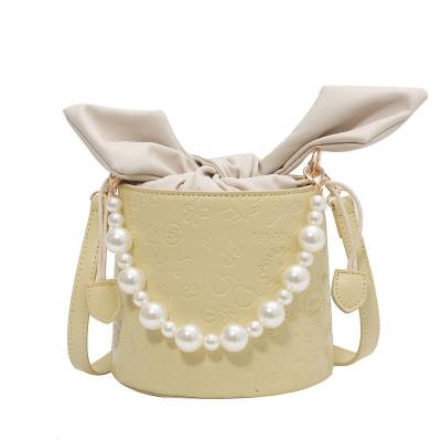 China 2022 Fashion Drop Shipping Bag Women's Western Popular Bucket Style Pearl Messenger Bag Embossed Shoulder Bag Portable for sale