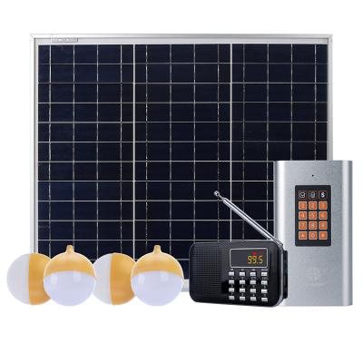 China JUA Energy 4 LED Home Lights Pay As You Go Solar Home Lighting Kits Portable USB Solar Home Energy System With FM Radio for sale