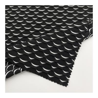 China Black And White Knitted Stretch Swimwear Fabric Polyester Spandex Stretched Fabric Jacquard for sale