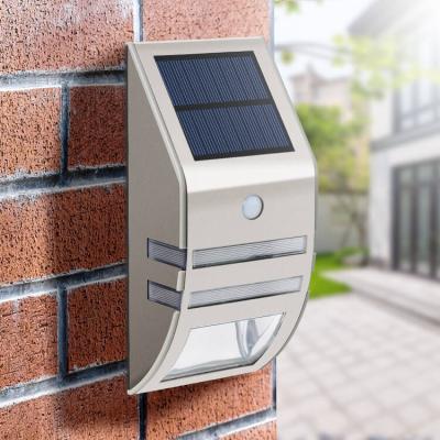 China New Fteck Outdoor Waterproof IP65 Aluminum Outside Motion Sensor Wall Mounted Garden Solar Power Lights Outdoor Led Wall Lamp for sale