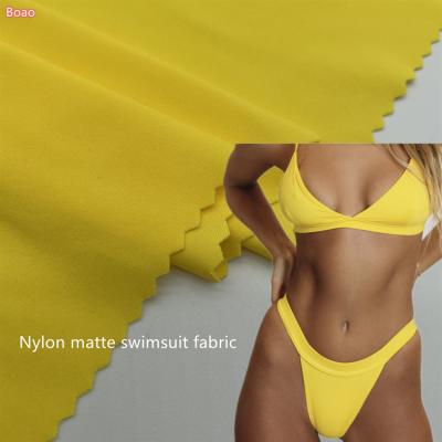 China Wicking Stain NS Lycra 82 Polyamide 18 Spandex 190g Extinction Swimwear Bikini Quick Drying Elastic Fabric for sale