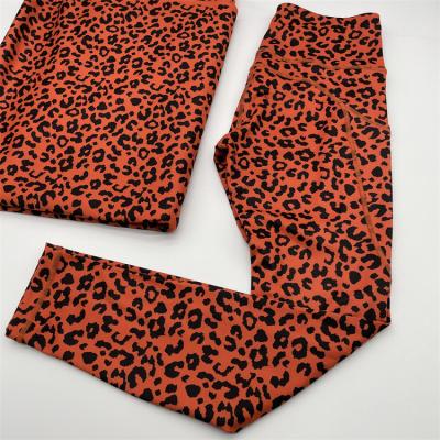 China Stock Wicking 73% Polyester 27% Spandex Digitally Printed Leopard Fabric For Yoga Tights And Pants for sale