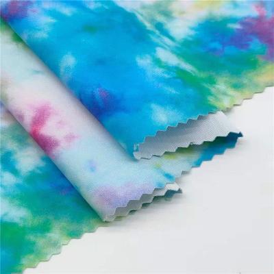 China QUICK DRY Warp Knitted Spandex Polyester Digital Printing Tie Dyed Color Shorts Beach Pants Swimwear Knitted Fabric for sale