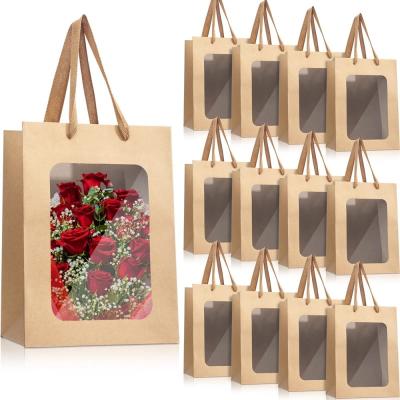 China Persoonlijke bloemen cadeau verpakking Kraft papieren zakken met transparant raam en aangepast logo Te koop