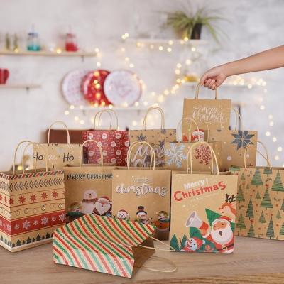 China Impresión en grabado Bolsa de papel Kraft biodegradable personalizada para fiestas de Navidad en venta