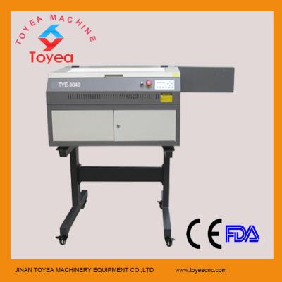 China mini laser engraving machine with support stand TYE-3040 for sale