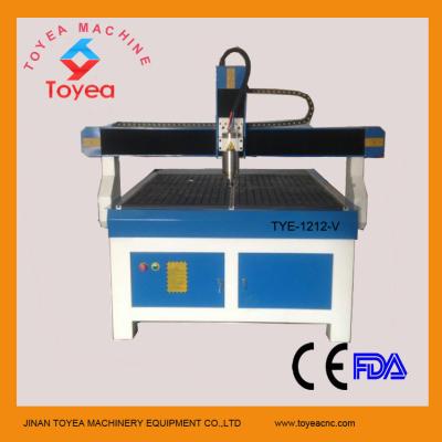 China Letter puzzles CNC Cutting machine cnc engraving machine with vacuum table TBI ball screw driving mode TYE-1212-V for sale