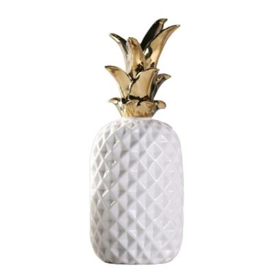 China Minimalist creative ceramic gold-plated glazed soft simulation pineapple ornaments model room living room study decorations for sale