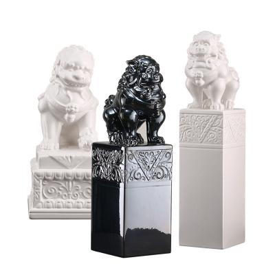 China New Minimalist Chinese Black And White Wine Cabinet Living Room Office Decoration Lion Paperweight Animal Ceramic Soft Decoration for sale