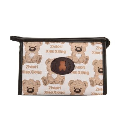 China Cute Fashoion Bear Pattern Logo Canvas Storage Pouch Women Travel Toiletry Makeup Cosmetic Custom Makeup Bag For Make Up for sale