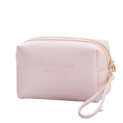 China Custom Design Print Fashoion Logo PU Leather Zipper Lock Make Up Cosmetic Bag Makeup Bag With Handle For Women for sale