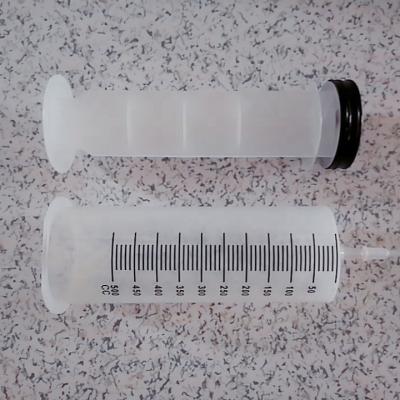 China 500ml 600ml Sterile Feeding Syringe Irrigation Syringe With Catheter Tip for sale