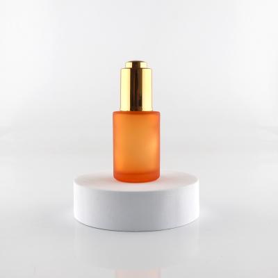 China Cosmetic Stable And Durable 50ml Metal Press Dropper Orange Essence Oil Bottle for sale