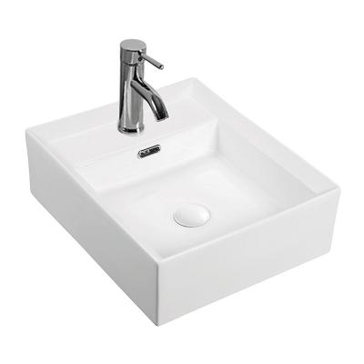 China Easy Clean Wholesale Ceramic Basin Sink Low Price Rectangular Sink Bathroom Dedicated for sale