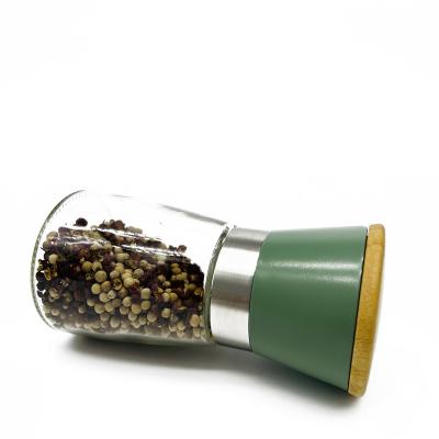 China Viable Manual Salt And Pepper Shakers Grinders Seasoning Empty Spice Glass Bottle Jars With Grinder Top for sale