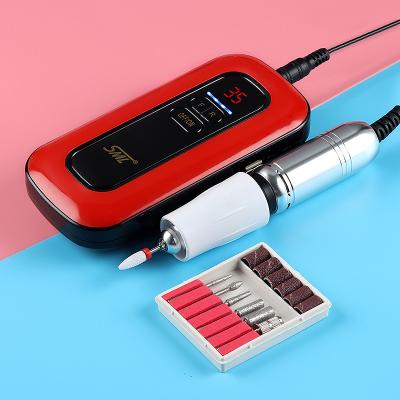 China Excellent SML Plastic Fashion Portable Electric Drill Nail Machine with 5 in 1 Drill Set for sale