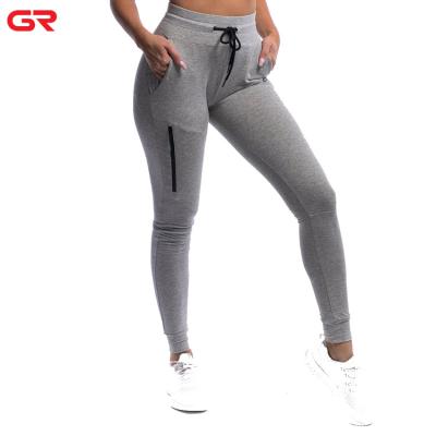 China Anti-Static French Terry High Waist Track Jogger Pants Custom Pocket Sports Tracksuit Slim Fit Women for sale