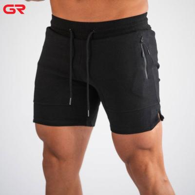 China Durable OEM Zipper Pockets Sweat Wicking Side Slit Hem Slim Fit Men's Gym Shorts for sale