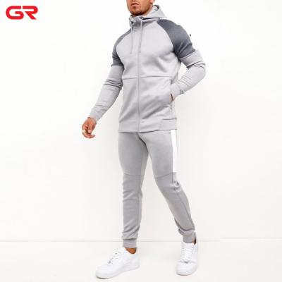 China Hot Selling Custom Sportswear Antibacterial Slim Fit Polyester Spandex Sweatsuit Zipper Pocket Tracksuits For Men for sale