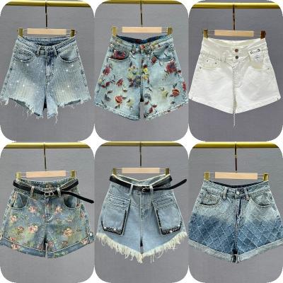 China QUICK DRY Women Rhinestone Cowgirl Distressed Denim Shorts With Pockets for sale