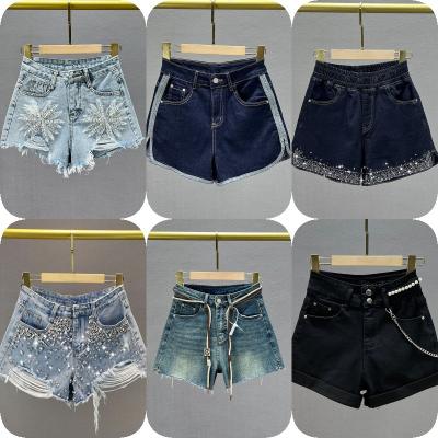 China QUICK DRY summer pocket tassel hole ripped jeans vintage casual comfort denim button zipper pants womens shorts jeans for sale