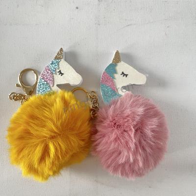 China Metal Glitter Uniron Tassel Keychain for sale