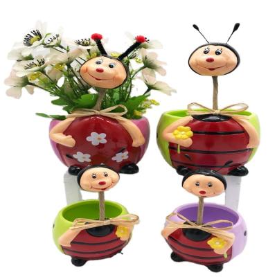 China Cartoon Animal Shaped Ceramic Flower Pot Bee Pot For Home And Garden Decoration Bonsai PlantersHandmade White Glazed Drawing for sale