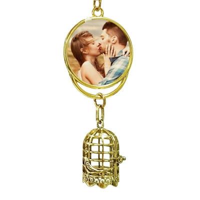 China Custom Sublimation Gold Blank Double Side Printable Round Shape With Birdcage Sublimation Car Pendant for sale