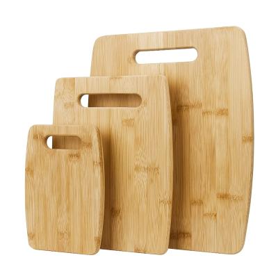 China Viable wholesale multi-functional bamboo double-sided chopping board and household three-piece wooden chopping board with handle for sale