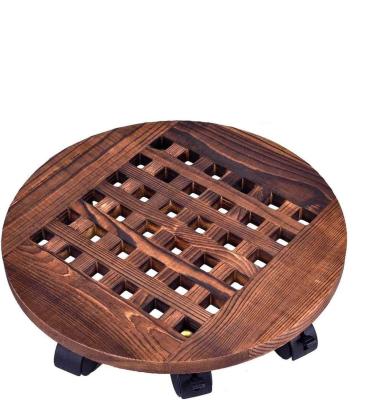 China Sustainable Wooden Outdoor Flower Pot Rack Cart Plant Stand With Swivel Casters for sale